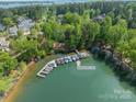 Aerial view of boat slip dock G #10, surrounded by trees and Lake Norman at 4599 Rustling Woods Dr, Denver, NC 28037