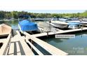 Close-up view of boat slip dock G #10 with boats on Lake Norman at 4599 Rustling Woods Dr, Denver, NC 28037