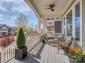 Cozy porch with comfortable seating, potted plants, and ceiling fan for outdoor enjoyment at 815 Digby Rd, Rock Hill, SC 29730
