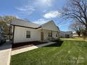 Well-maintained lawn and stylish white exterior highlight this beautiful property at 1022 Johnna Ln, Indian Land, SC 29707