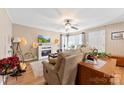 Inviting living room with fireplace, ceiling fan, and comfortable seating arrangement at 207 N Sims St, Kings Mountain, NC 28086