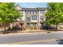 Attractive townhomes with colorful exteriors and beautiful landscaping, perfect for families at 3718 Speer Blvd, Charlotte, NC 28217