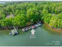Aerial of community boat slip includes multiple boats and ample docking space at 4646 Eagle Pointe Ct, Denver, NC 28037