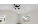 Cozy bedroom with neutral walls, ample natural light, and a ceiling fan at 5611 Skinny Down, Charlotte, NC 28215
