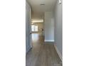 Inviting home entryway showcases wood-look tile flooring and a seamless transition to the living spaces at 906 Wisteria Way, Salisbury, NC 28146