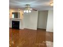 Cozy living room featuring hardwood floors and a fireplace at 139 Sain Rd, Statesville, NC 28625