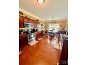 Well-equipped kitchen featuring stainless steel appliances and ample cabinet space at 16306 Hayfield Rd, Charlotte, NC 28213