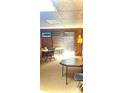 Finished basement with wood paneling and a door leading to the exterior at 453 Cotton Ct, York, SC 29745