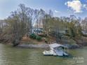 Picturesque waterfront home on a lush lot, complete with a private dock and boat lift at 8172 Summit Ridge Dr, Catawba, NC 28609