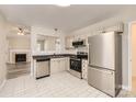 Modern kitchen features stainless steel appliances, tile backsplash, and white cabinets at 3023 Fairglen Rd, Charlotte, NC 28269