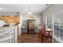 Bright dining area with natural light, hardwood floors, and traditional decor at 3048 Misty Harbor Cir # E, Cramerton, NC 28032