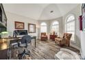 Bright home office with arched windows, wood floors, and comfortable seating at 324 Kerrydale Ct # 106, Clover, SC 29710