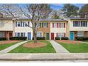 Charming townhomes featuring colorful doors, shutters and well-maintained lawns at 1113 Keswick Pl # 118, Monroe, NC 28112