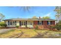Charming single-story home featuring brick and siding with well-maintained landscaping at 2020 Parkdale Ave, Gastonia, NC 28052