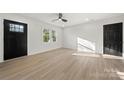 Bright living room showcases new floors, fresh paint, and plenty of natural light at 2120 Green Oak Dr, Shelby, NC 28152