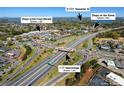 Aerial view showing the property's proximity to I-77 Interchange, Shops at the Fresh Market, and Shops on the Green at 21721 Shoveller Ct, Cornelius, NC 28031