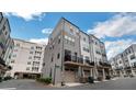 Modern townhomes with balconies and garage parking in a well-maintained neighborhood at 3105 Beans Blvd, Charlotte, NC 28203