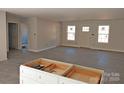 Spacious living area featuring hardwood floors, light-filled windows, and neutral paint, offering a bright and modern aesthetic at 1127 Mckay Rd, Newton, NC 28658