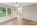 Living room with lots of natural light and wood flooring at 1320 Beaconfield Ct, Rock Hill, SC 29730