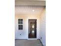View through front door, showing light walls, dark wood floors and trim, and open floorplan at 2035 Talbert Ct, Charlotte, NC 28214