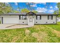 Charming one story home with a brick front, attached garage, and well maintained front yard at 504 Katherine Ave, Kings Mountain, NC 28086