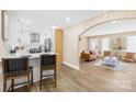 Bright living room and kitchen area with stainless steel appliances and hardwood style floors at 504 Katherine Ave, Kings Mountain, NC 28086