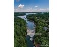 Stunning waterfront property with mature trees and direct access to the serene lake at 8915 Linden Grove Ct, Sherrills Ford, NC 28673