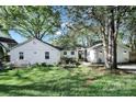Charming single-story home featuring well-maintained landscaping and mature trees in a desirable neighborhood at 2314 Wolfe St, Charlotte, NC 28205