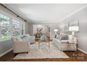Bright and airy living room with hardwood floors and ample natural light at 3524 Johnny Cake Ln, Charlotte, NC 28226