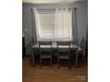 Simple dining area with hardwood floors and bright window at 554 Trexler Ln, Rock Hill, SC 29732