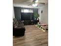 Cozy living room with modern flooring and large TV at 554 Trexler Ln, Rock Hill, SC 29732