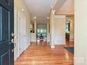 Spacious entryway with hardwood floors and elegant trim at 6144 Abergele Ln, Matthews, NC 28104