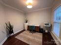 Well-lit office space features a modern desk setup and sleek decor at 8011 Caliterra Dr, Charlotte, NC 28227