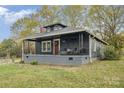 Charming home with covered porch, black paint, and easy outdoor living at 1013 East Dr, Gastonia, NC 28052