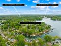 Panoramic aerial view showcasing the neighborhood and convenient access to Shops @ the Fresh Market and Hello Sailor & Holiday Marina at 21220 Rio Oro Dr, Cornelius, NC 28031