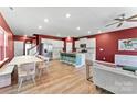 Open-concept living space with hardwood floors, modern lighting, and a spacious kitchen at 423 Wescott St # 73, Indian Trail, NC 28079
