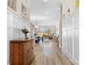 Elegant foyer featuring hardwood floors and detailed trim work at 14015 Cameryn Elise Dr, Cornelius, NC 28031