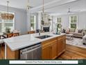 Bright, open-concept space with a gourmet kitchen, dining area, and a comfortable living area with a fireplace at 280 Gilead Rd, Huntersville, NC 28078