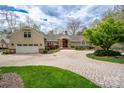 Circular driveway, mature trees, and attached garage highlight the exterior of this home at 345 Porters Glen None, New London, NC 28127