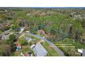 Spacious property with a defined boundary line showcases a cozy home surrounded by lush greenery and mature trees at 4896 Birch Cir, Hickory, NC 28602
