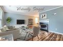 This staged living room boasts hardwood floors, a cozy fireplace, and plenty of natural light at 5913 Crape Myrtle Ln, Charlotte, NC 28216
