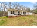 Charming single story home with a brick foundation and a covered front porch at 1197 Fincher Rd, Fort Lawn, SC 29714