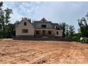 Attractive two-story home with stone accents and covered porch on a large lot at 1204 Sage Pine Cir, Clover, SC 29710