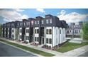 Beautiful townhome featuring modern exterior, landscaping, and well-manicured flower beds at 2512 Park Rose Ln # 16, Charlotte, NC 28204