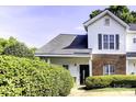 Home exterior with well-maintained landscaping and inviting entrance at 6359 Mallard View Ln, Charlotte, NC 28269