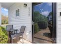 Cozy front porch with seating area, perfect for relaxing outdoors at 6359 Mallard View Ln, Charlotte, NC 28269