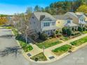 Aerial view of a well-maintained home with a landscaped yard in a peaceful neighborhood at 7554 Coastal Way, Huntersville, NC 28078