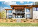 Beautiful two-story home with a spacious covered patio and landscaped backyard at 233 Conifer Way, Shelby, NC 28150
