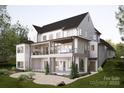 Spacious outdoor entertaining deck and terrace on a new construction home with views at 20114 Norman Colony Rd, Cornelius, NC 28031