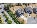 Aerial view of a home nestled on a cul-de-sac, featuring a large backyard and mature landscaping at 2248 Killian Creek Dr, Denver, NC 28037